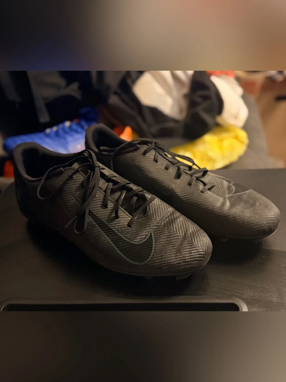 Nike Men’s Black Soccer Cleats with Subtle Blue Swoosh